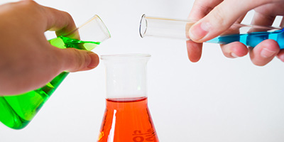chemical beakers with colorful liquids